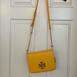 Like new Tory Burch yellow crossbody bag.  Very gently used, like new condition.